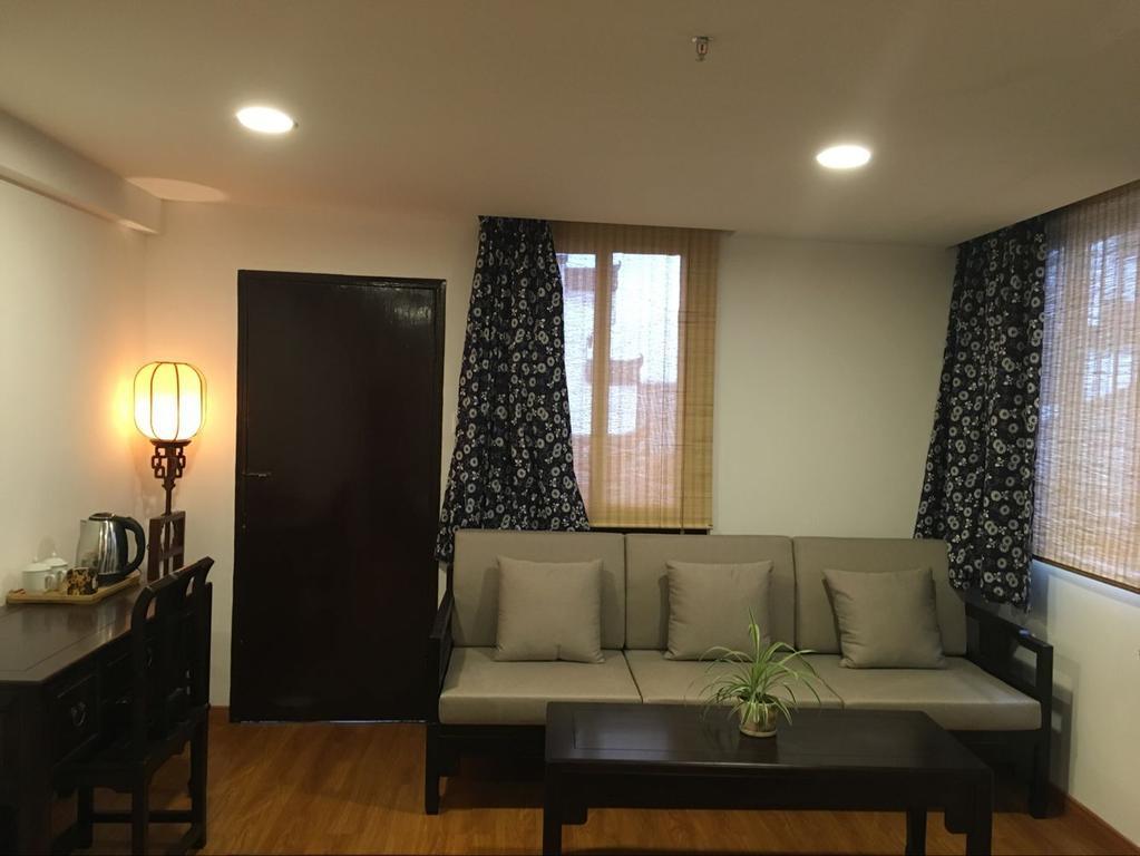 Tun XI Lodge Montes Huang Habitación foto