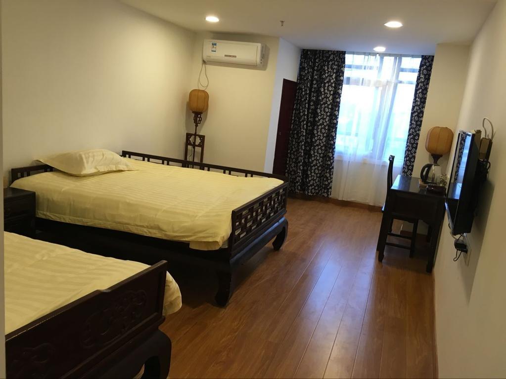 Tun XI Lodge Montes Huang Habitación foto